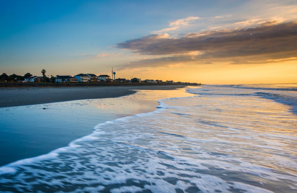 Sunrise over the Atlantic Ocean in Folly Beach, South Carolina.